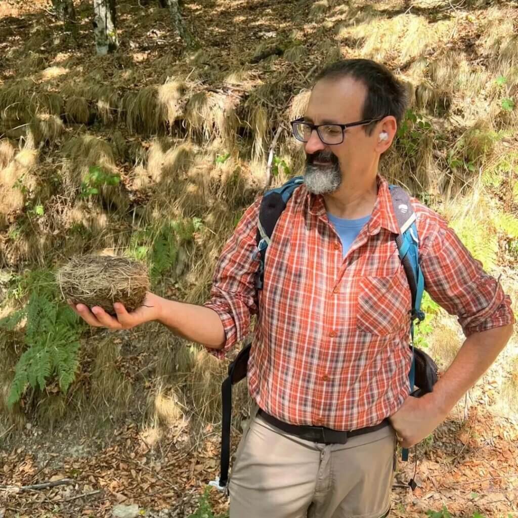Birder with nest